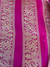 Load image into Gallery viewer, Pink fabric with intricate gold patterns
